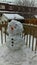 Winter Snowman on Porch in Storm