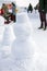 Winter snowman scene with snow and trees