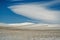 Winter snowy landscape with lenticular clouds