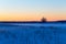 Winter snowy rural landscape in evening