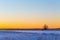 Winter snowy rural landscape in evening