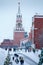 Winter Spasskaya Tower with big chime, Christmas tree and people at Moscow Red Square after great snowfall