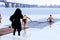 Winter sports, Hardening. People swimming in the river. Orthodox holiday of Epiphany, Dnipro city, Dnepropetrovsk, Ukraine,