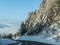 Winter street at early morning in Austrian mountains.