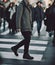 Winter Stroll, Navigating the City Streets - Man\\\'s Journey through the Crosswalk Crowd. Generative AI