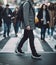Winter Stroll, Navigating the City Streets - Man\\\'s Journey through the Crosswalk Crowd. Generative AI