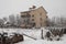 Winter suburb covered with huge amount of white snow. Streets of small town