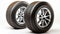 Winter and summer auto tires. A pair of tires. Wheels of vehicles stacked up. lone automobile tires on a white background.