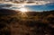 Winter sunrise over desert field