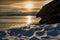 Winter sunset near the rocks with snow the frozen Baikal Lake