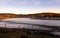 Winter sunset over the River Dee estuary at low tide at Kirkcudbright Harbour