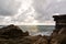 Winter sunset at rocks by the sea. Cavi di Lavagna. Tigullio gulf. Liguria. Italy