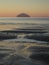 Winter sunset shot of the island of Ailsa Craig and Girvan beach, Scotland