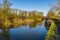 Winter sunshine gives a golden hue to the Grand Union Canal near Foxton Locks, UK