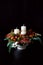 Winter table centerpiece wreath with candles, new year toys and