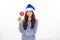 Winter teenager girl with christmas lollipop. Portrait photo of happy young female teenager in winter sweater isolated