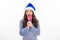 Winter teenager girl with christmas lollipop. Teen girl in christmas winter sweater on white isolated background.