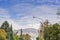 Winter Tehran street view in Tehran International Exhibition Center with snow covered Alborz Mountains against cloudy sky on