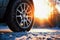 Winter tire covered in snow snowy road ice icy car wheel drive safety safe driving transportation condition change