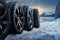 Winter tire elegance four black tires navigate a snowy landscape