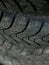 Winter tires close-up . Tyre background. Tire stack background