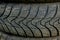 Winter tires close-up . Tyre background. Tire stack background