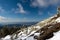 Winter trail in Jeseniky mountains in zhe Czechia during nice winter day with clear sky. Wiew of Praded hill with communication to