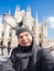 Winter travel, vacations and birds concept - Handsome male tourist with funny pigeons making selfie photo in front of