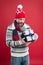 Winter trends. Knitted hat scarf sweater. Winter knitwear. Mature man red background. Buy gift. Bearded man in winter