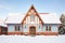 winter tudor, gable against snowy backdrop