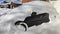 Winter urban scene in Canada. Vehicles covered with snow in the winter blizzard in the parking. Cars in snowdrifts after a snowfal