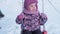 Winter, vacation, games, family concepts - close up of authentic happy little preschool minor 3-4 years old girl in