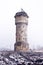 Winter view on an abandoned water tower in former Uthemann ironwork. in Katowice, Silesia, Poland