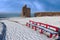 Winter view of ballybunion castle and red benches