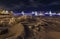 Winter view of decorated Palace bridge in St. Petersburg. Illuminated Palace bridge over frozen Neva river in winter night is a