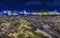 Winter view of decorated Palace bridge in St. Petersburg. Illuminated Palace bridge over frozen Neva river in winter night is