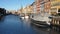 Winter view down Nyhavn canal with frozen water