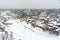 A winter view of the small old town in Russia with medieval churches, monastery, old-fashione houses