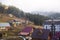 Winter view of winter ski resort with houses, cottages and woods