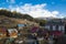 Winter view of winter ski resort with houses, cottages and woods