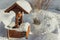 Winter village landscape. Wooden well with a winch in the snowdrifts. An old and rare water extraction device.frosty day