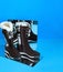 Winter warm womens boots with lacing with mirrors on a blue background