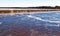 Winter water and ice flowing over Mohawk River dam