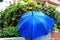 Winter, Weather in Israel. Umbrella with raindrops on the fence, after the rain