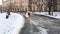 Winter wedding. Aerial view, newlywed couple in wedding dresses are runing with colorful balloons through the snow