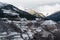 Winter in winter Pyrenees mountains. snow-covered stone terrace and icy mountain peaks on background