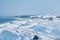 Winter wonderland and Christmas fantasy landscape. Frozen sea coast and mountains covered with snow as holiday