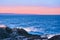 Winter wonderland and Christmas fantasy landscape. Frozen sea coast and mountains covered with snow as holiday