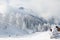 Winter wonderland. Mountain landscape wit snowcapped alpine hut