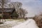 Winter Wonderland: Snow-Covered European Village Countryside. A Snow-Covered European Village in the Picturesque